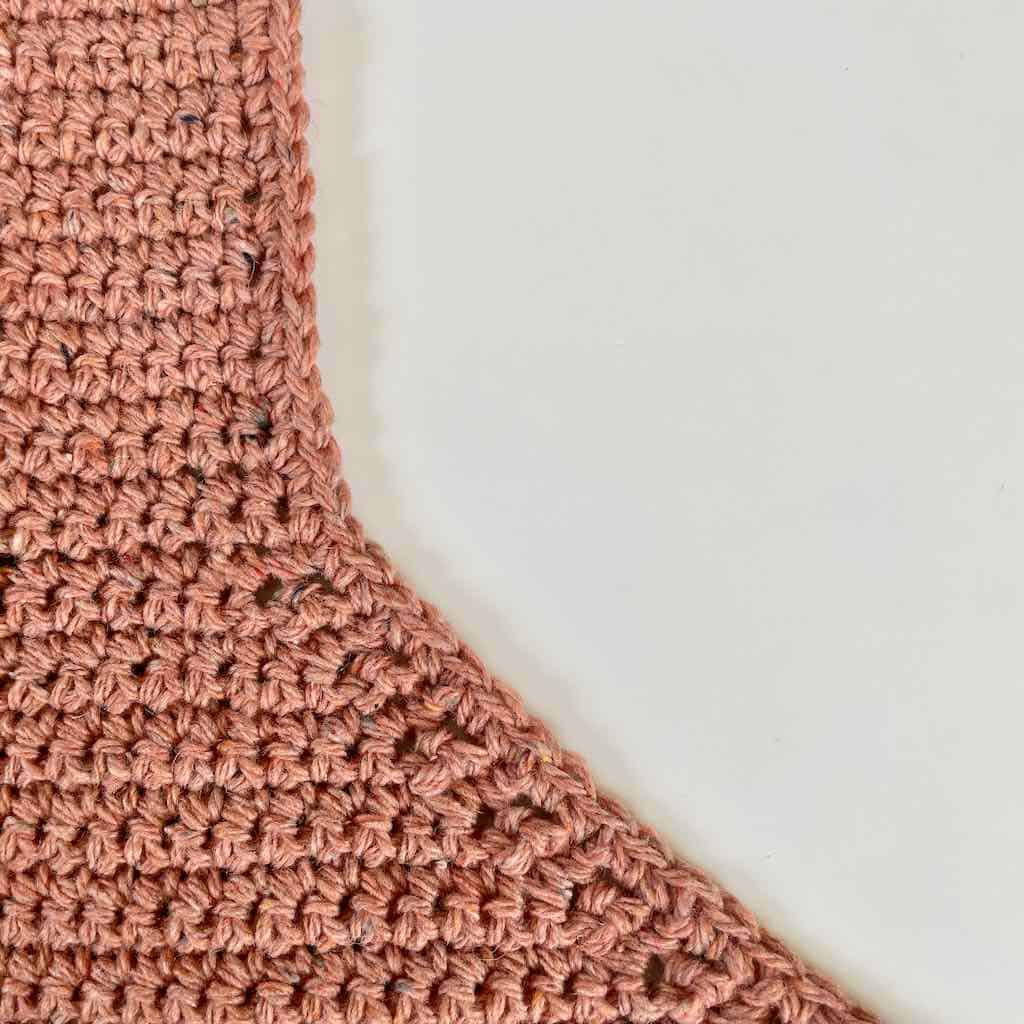 Photo of the single crochet around the edge of the strap opening