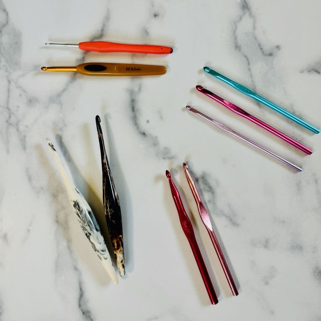 Crochet hooks of various sizes and shapes.