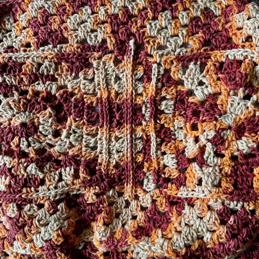 A closeup photo of the seam for the granny square cowl